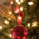 red Christmas bell on Christmas tree