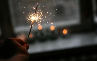 person holding sparkler