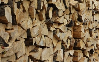 brown wooden log lot during daytime