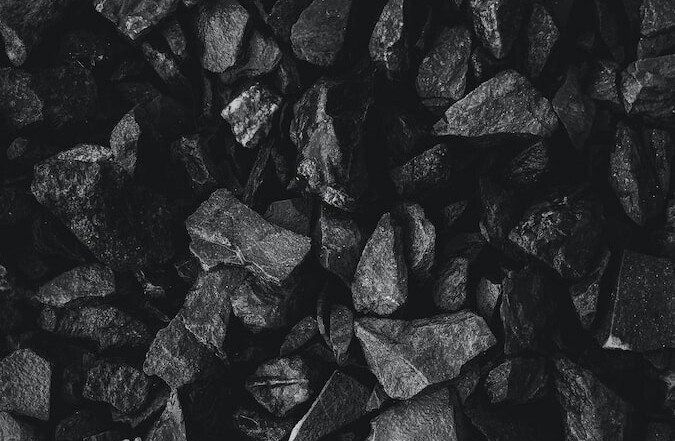 grayscale photo of stone